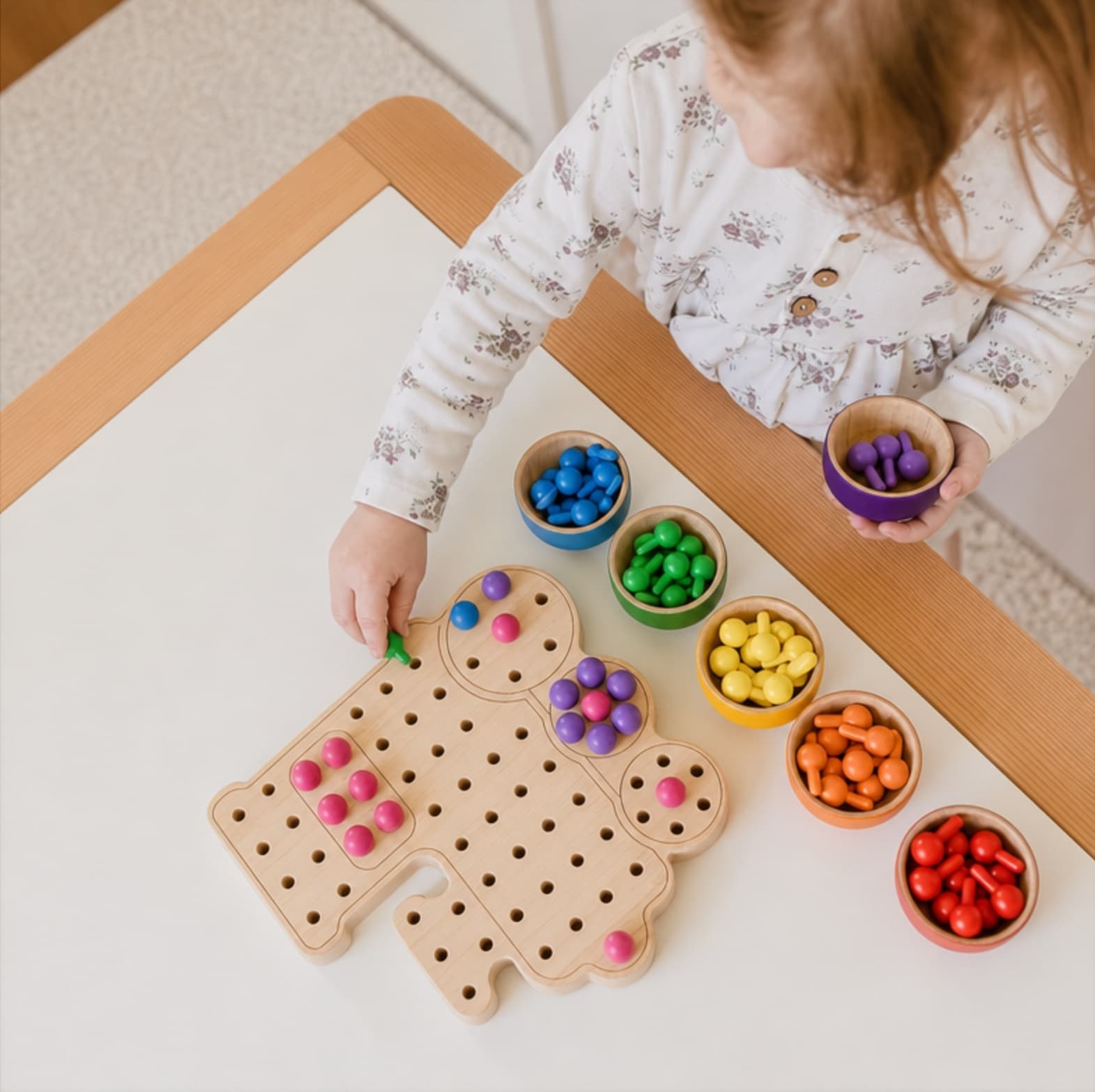 natural wooden train pegboard