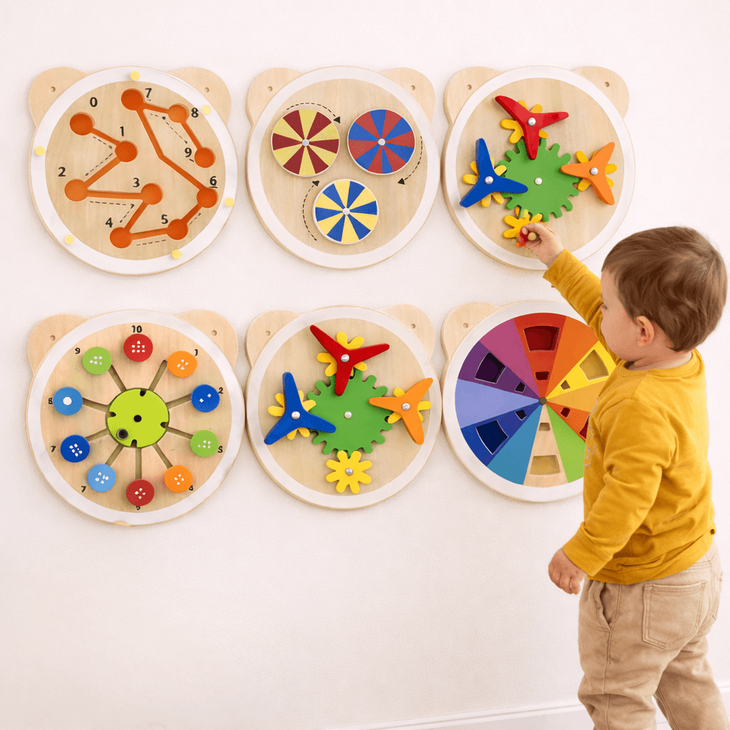 boy playing with round viga wall toys