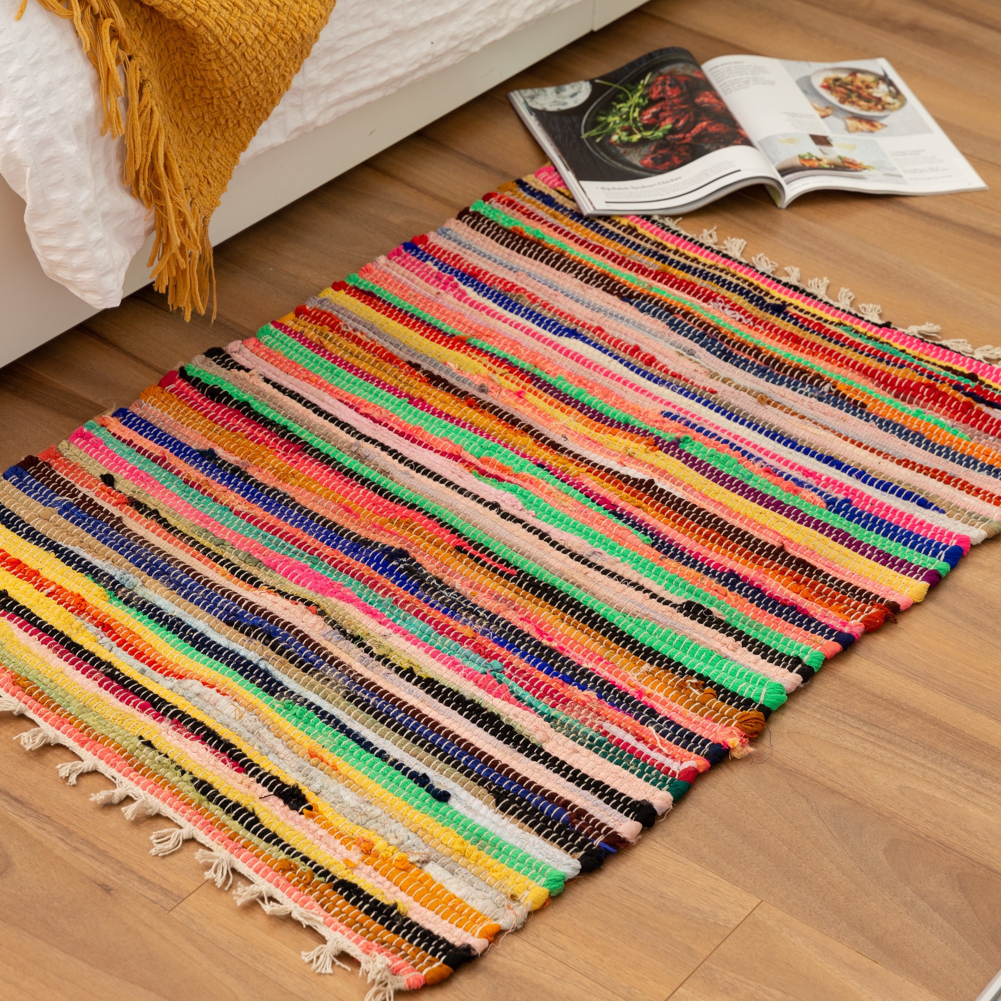 Colourful and hard wearing chindi cotton and jute oval rug for home  interior use available in four sizes