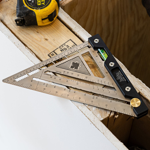 JessEm Quick Angle Square 07431 resting on framing lumber at a jobsite, action shot