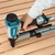 Makita AT2550A 1 inch wide crown stapler in use fastening material