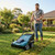 Makita DUV320Z scarifier on lawn in outdoor use