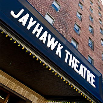 <p>The Historic Jayhawk State Theatre of Kansas, is a theater located in downtown Topeka, Kansas, United States. The theatre opened on August 16th 1926. The Jayhawk Hotel & Crosby Bros shopping complex where attached to the theatre making it a grand complex for visitors to eat, sleep and be entertained. <p><p>Click &lsquo;Choose a Product&rsquo; above to get this image hand printed on a ceramic 4x4 custom coaster, cutting board, magnet, ceramic trivet, ornament, dog tag or canvas.</p>