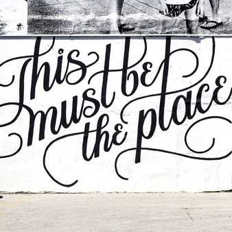 Mural located on the wall of RoCa, a stylish brick-walled eatery serving New American entrees, small plates & craft cocktails. It was created by Iowa artist Anna Frederick.