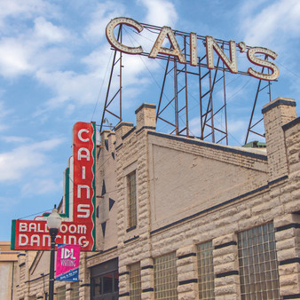 Featuring the Cain's Ballroom and Dance Hall, this retro print represents the history and evolution of Cain's itself. Artists from all regions and genres perform here, making it a place for everyone.