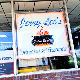 A locally famous Cajun Food Quick Stop. Jerry Lee has grown his menu to include customer favorites like fresh fried cracklins, pork skins, hog-head cheese, beef jerky, green onion sausage, and Italian sausage.