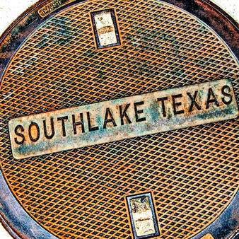 Honoring its historic architecture, Carrollton uses its steel-netted manhole. Featuring a small-town vibe that visitors love, Southlake is neighbors with Grapevine and Keller  two other quirky suburban towns. Though the Southlake area was settled in the mid 1800s, the city itself didnt form until the 1950s due to the boom-burb.