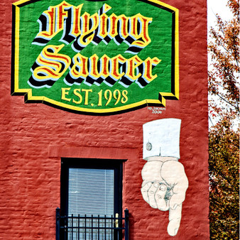 Flying Saucer is a beer bar founded in 1998 serving the craft beer to the Beerknurds  in Downtown Little Rock.