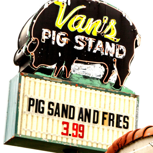 Van's Pig Stand is one of Oklahoma's oldest barbeque restaruants! Around 1928, Van opened his first Pig Stand in a hotel in Wewoka, Oklahoma. It was a small little store serving barbecue such as the Pig Sandwich® and Ribs. The menu also included other types of sandwiches such as Liverwurst, Pimento, Chicken Salad, and Cream Cheese. In 1929 a second Pig Stand opened in Seminole and was then sold in 1935. Pig Stands were later opened in Wichita Falls, Texas and Wichita, Kansas. Van's Pig Stand is one of Oklahoma's oldest barbeque restaruants! Around 1928, Van opened his first Pig Stand in a hotel in Wewoka, Oklahoma. It was a small little store serving barbecue such as the Pig Sandwich® and Ribs. The menu also included other types of sandwiches such as Liverwurst, Pimento, Chicken Salad, and Cream Cheese. In 1929 a second Pig Stand opened in Seminole and was then sold in 1935. Pig Stands were later opened in Wichita Falls, Texas and Wichita, Kansas.
