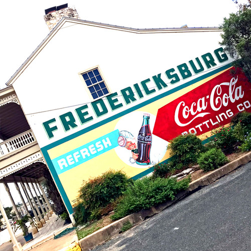 Placed on the side of its Coca-Cola Bottling Company, Fredericksburg uses this mural to show off a bit of its history.