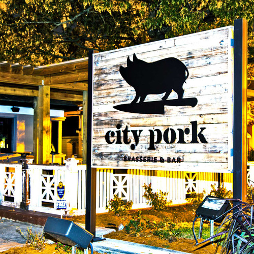 City Pork Brasserie & Bar is a full service restaurant concept that strives to elevate Louisiana cuisine to new levels. The modern rustic interior of the Brasserie features a full bar, wine list and signature cocktails.