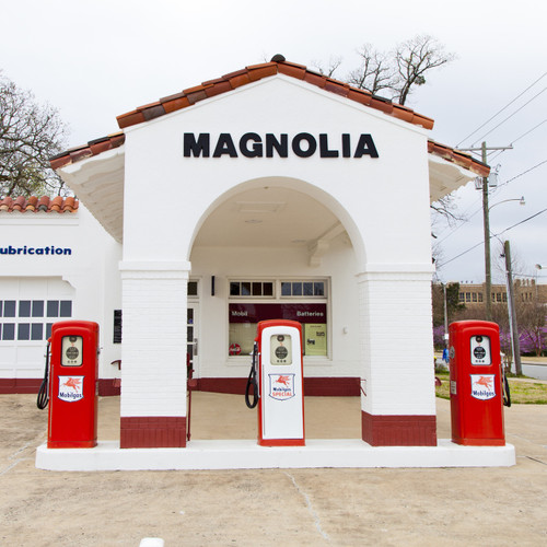 The Magnolia Petroleum Company Filling Station is a historic automotive service station building at Larch and 1st Streets in Kingsland, Arkansas. It is a small single-story masonry building, built of red and buff brick and covered by a gabled roof.  A concrete pad in front of the building originally supported the fuel pumps. The building was built about 1930 and is an excellent example of an early filling station with Tudor and Craftsman features, built to a Magnolia Company design, which was used for at least one other filling station in North Little Rock (which was destroyed after a fire in 2018).
