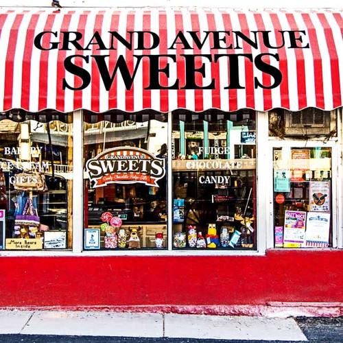 Grand Ave Sweets is a family owned business in downtown Glenwood Springs. This storefront is known for its flavored popcorn, candy, saltwater taffy, fudge, and homemade chocolate candies. Grand Ave Sweets is a family owned business in downtown Glenwood Springs. This storefront is known for its flavored popcorn, candy, saltwater taffy, fudge, and homemade chocolate candies.
