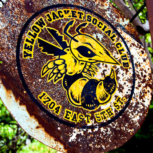 Cozy watering hole known for its global nibbles, dog-friendly patio & recycled wood & stone decor.