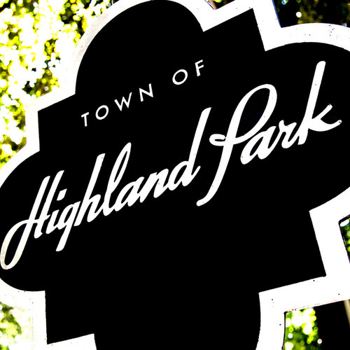 Welcoming visitors and tourists to this affluent town is a black and white Highland Park sign. Located in central Dallas County, the population is rather small, granting it with an exclusive and luxurious charm. Welcoming visitors and tourists to this affluent town is a black and white Highland Park sign. Located in central Dallas County, the population is rather small, granting it with an exclusive and luxurious charm.