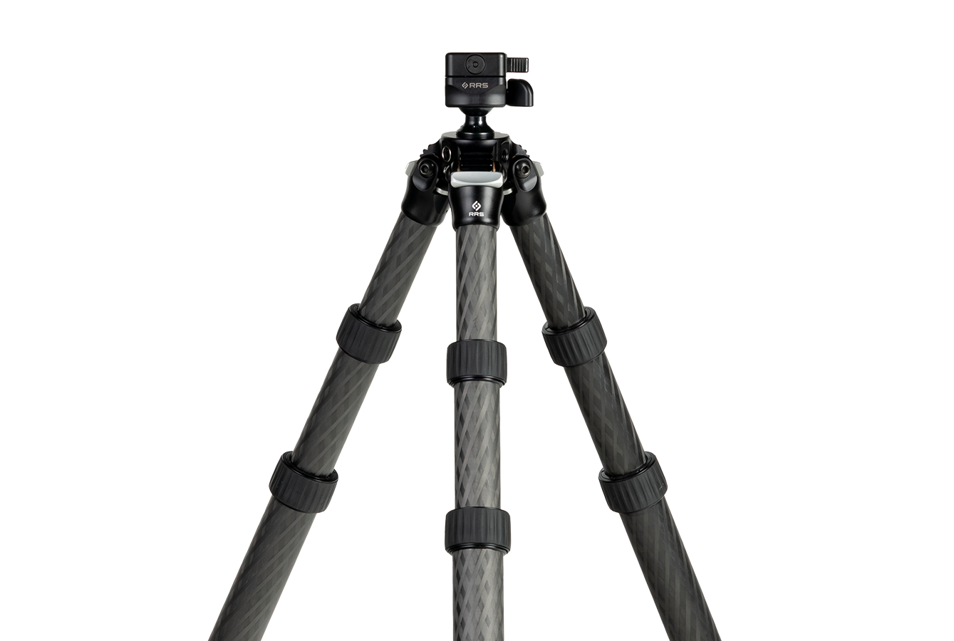 Shooter behind rifle in prone or seated position with Benchmark Inverted tripod and Anvil-30 ARC, legs spread wide to show stability and inverted design