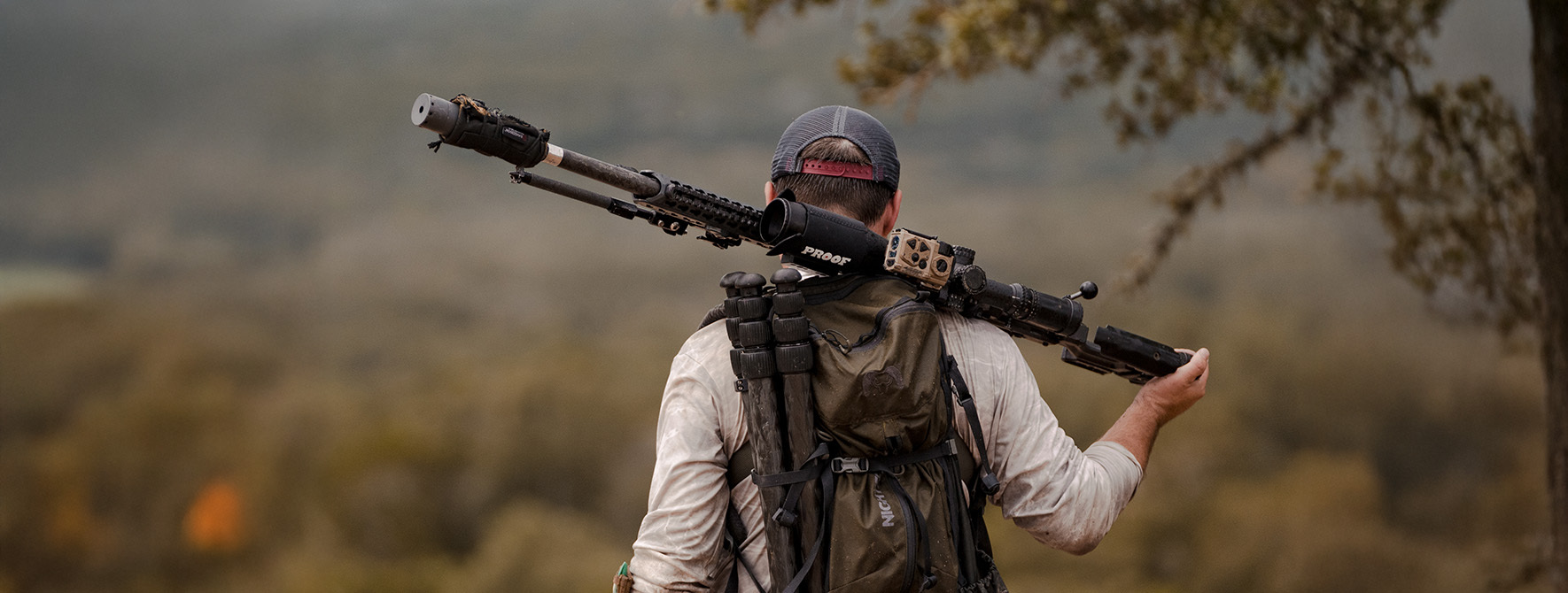 SOAR Home Page Content Block of Hunter with tripod in their backpack