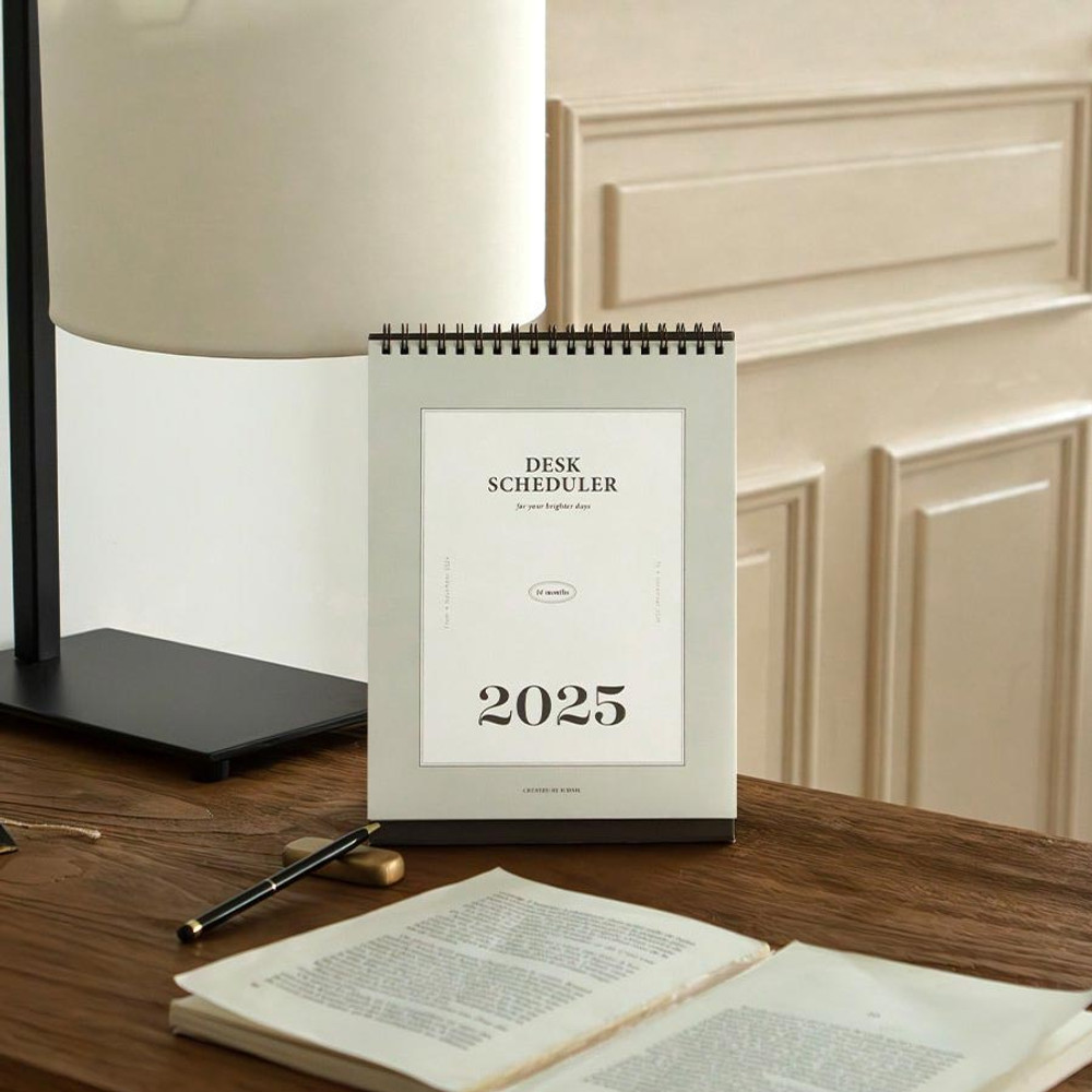 Usage example of Iconic 2025 Standing Flip Monthly Desk Calendar