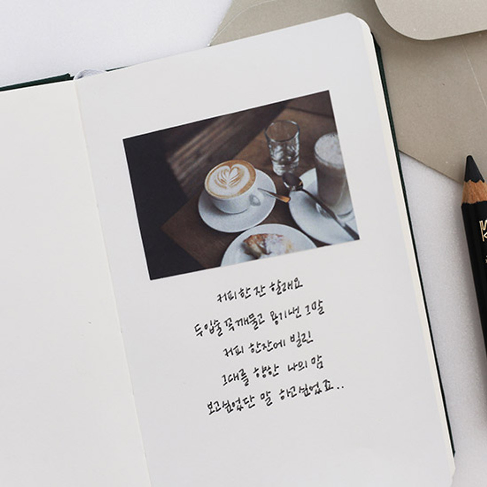 Example of use -  Prism 180 pages small blank notebook with elastic band