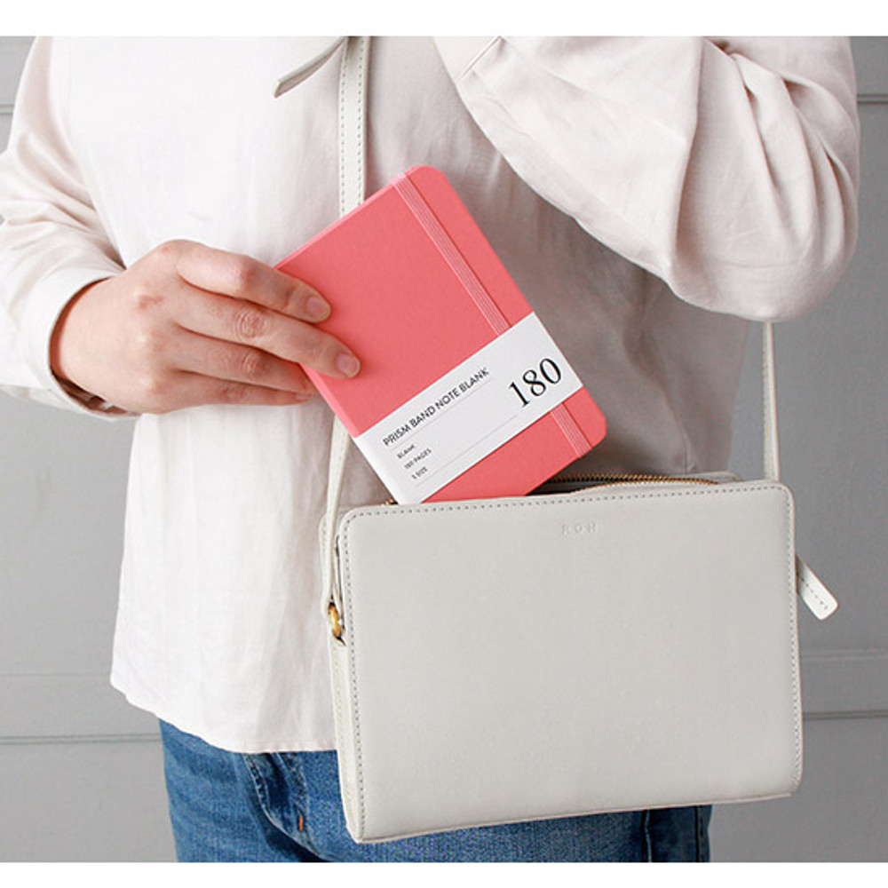 Example of use -  Prism 180 pages small blank notebook with elastic band