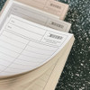 Detail of More Basic Long Lined Grid Notepad