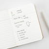 2027 Making Memory Mini diary open to a lined daily page with handwritten Korean notes and small sketches.