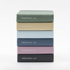 Six stacked 2027 Making Memory Mini diaries showing textured fabric spines with the product name and year.