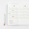 2027 and 2028 yearly reference calendars in the Byfulldesign Notable Memory planner, with colored stickers and handwritten goals.