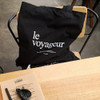 Le voyageur black cotton shoulder tote bag