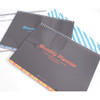 Wirebound undated monthly desk planner