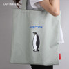 Lazy holiday penguin eco tote bag