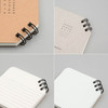 Detail of Corner mini spiral lined/grid notebook