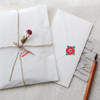 Envelopes sealed with unique shape paper stickers