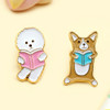 Lovely puppy reading a book badge