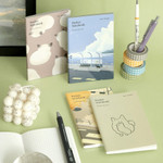 Iconic Moments We Love Pocket Grid Notebook