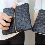 Embossing geometric pattern pouch bag