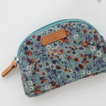 A low hill basic winter half moon coin case