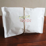 Gift package decorated with floral masking tape stickers