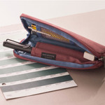 Detail of Oxford half zip around pocket pencil pouch