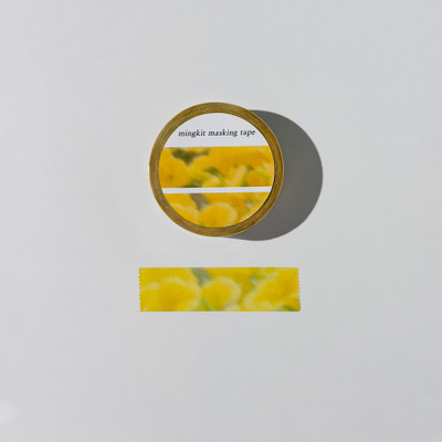 Flower Blur washi tape roll and a strip of yellow floral pattern