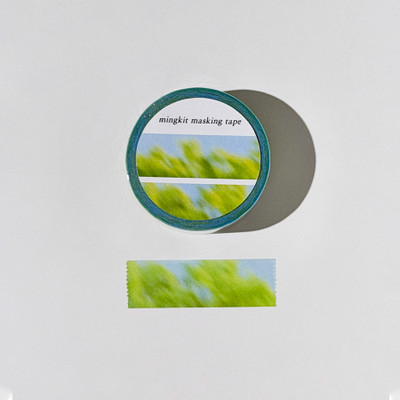 Green Blur washi tape roll with a blue and green photographic pattern