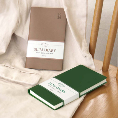Planner showing its slim profile and portability.