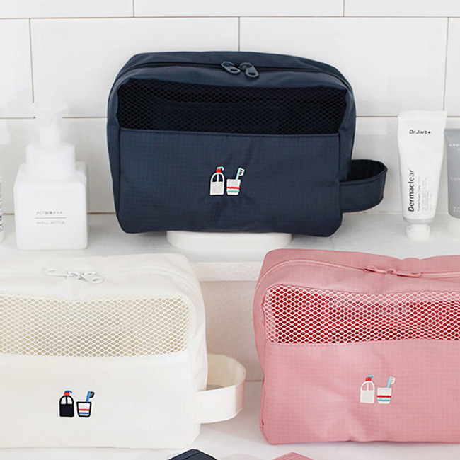 Travel toiletry bag with hand strap