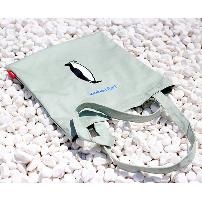 Lazy holiday penguin eco tote bag