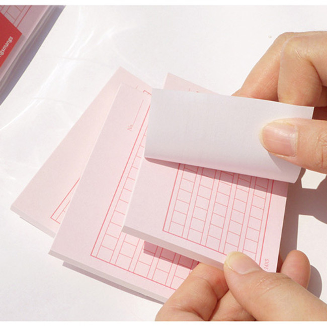 Pink squared manuscript paper sticky memo note 