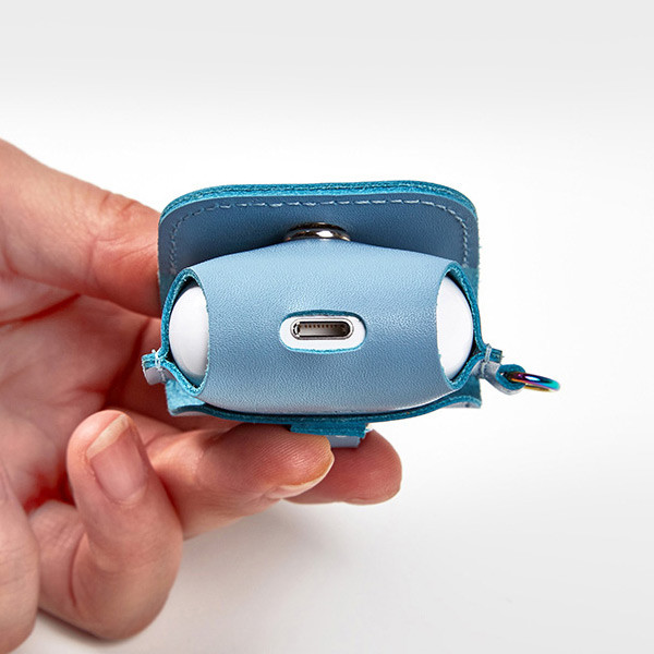 Detail of Antenna Shop Holographic real leather AirPods case bag