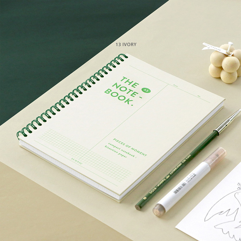 13 Ivory - ICONIC Vertically half divided wire bound A5 grid notebook