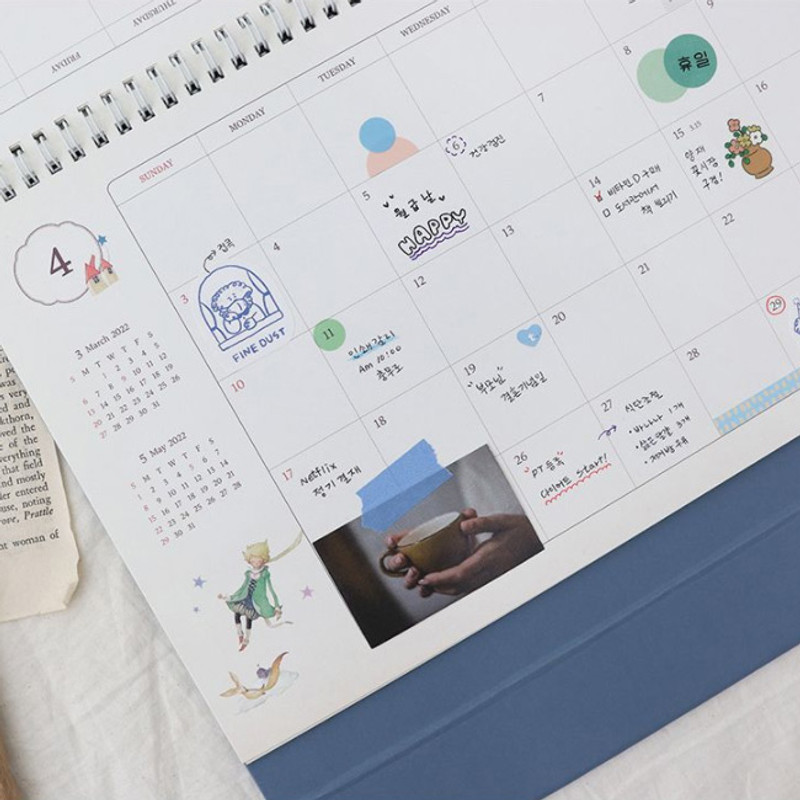 Front - Indigo 2022 Prince Story monthly desk standing calendar Front - Indigo 2022 Prince Story monthly desk standing calendar