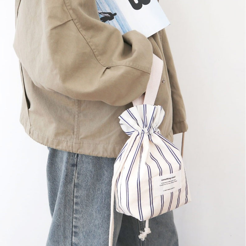 Example of use - O-check Something Usual Cotton Drawstring Pouch Example of use - O-check Something Usual Cotton Drawstring Pouch