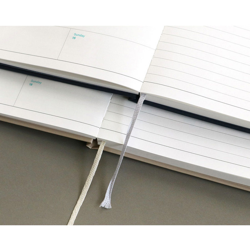 Opens flat & Ribbon bookmark - Iconic 2026 Flow Dated Weekly Diary Planner Opens flat & Ribbon bookmark - Iconic 2026 Flow Dated Weekly Diary Planner